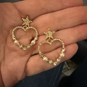 Gold Tone Open Heart Dangling Earrings Framed in crystals & Pearls.